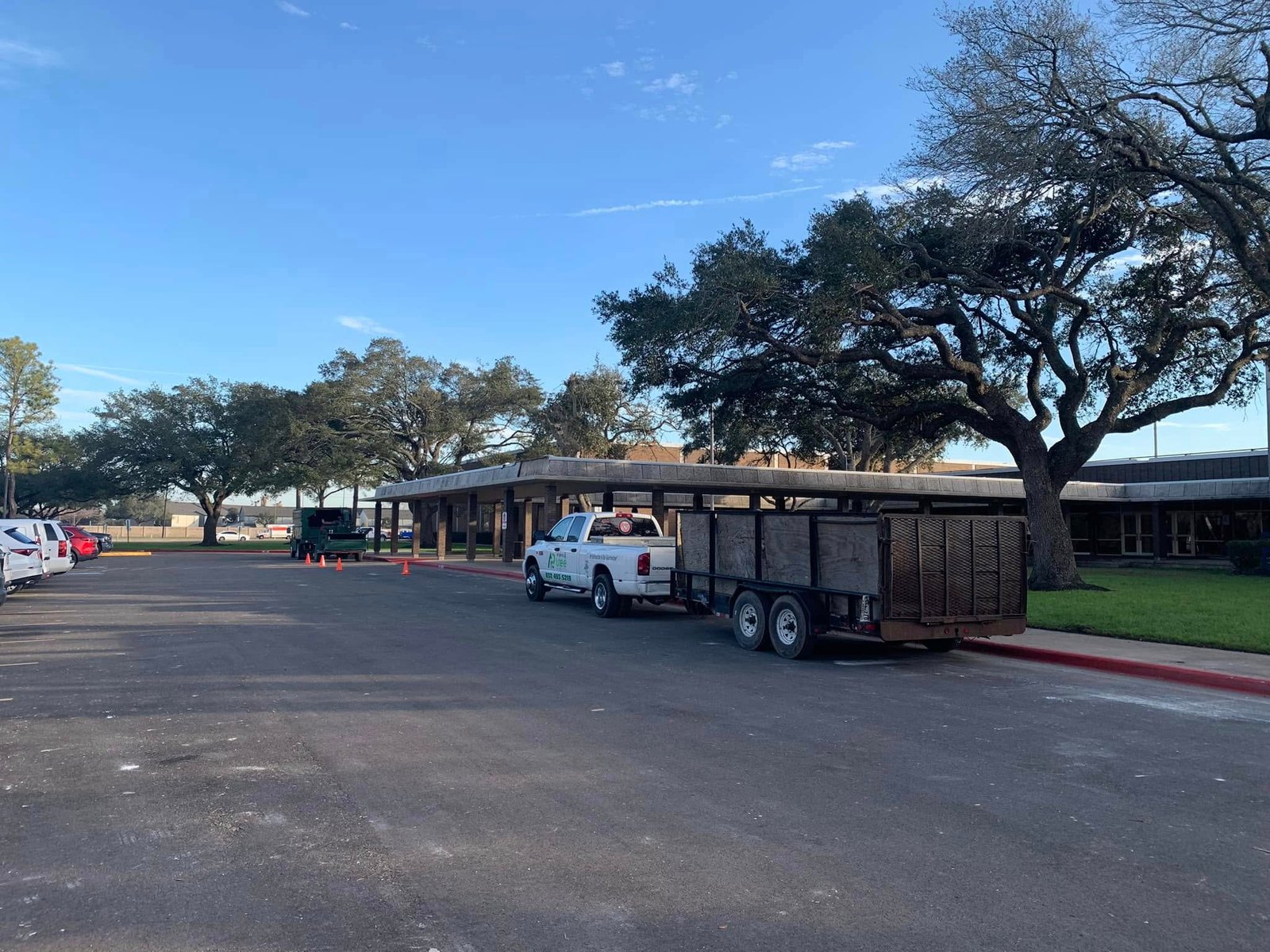 All Points Tree Service truck and debris trailer at a worksite